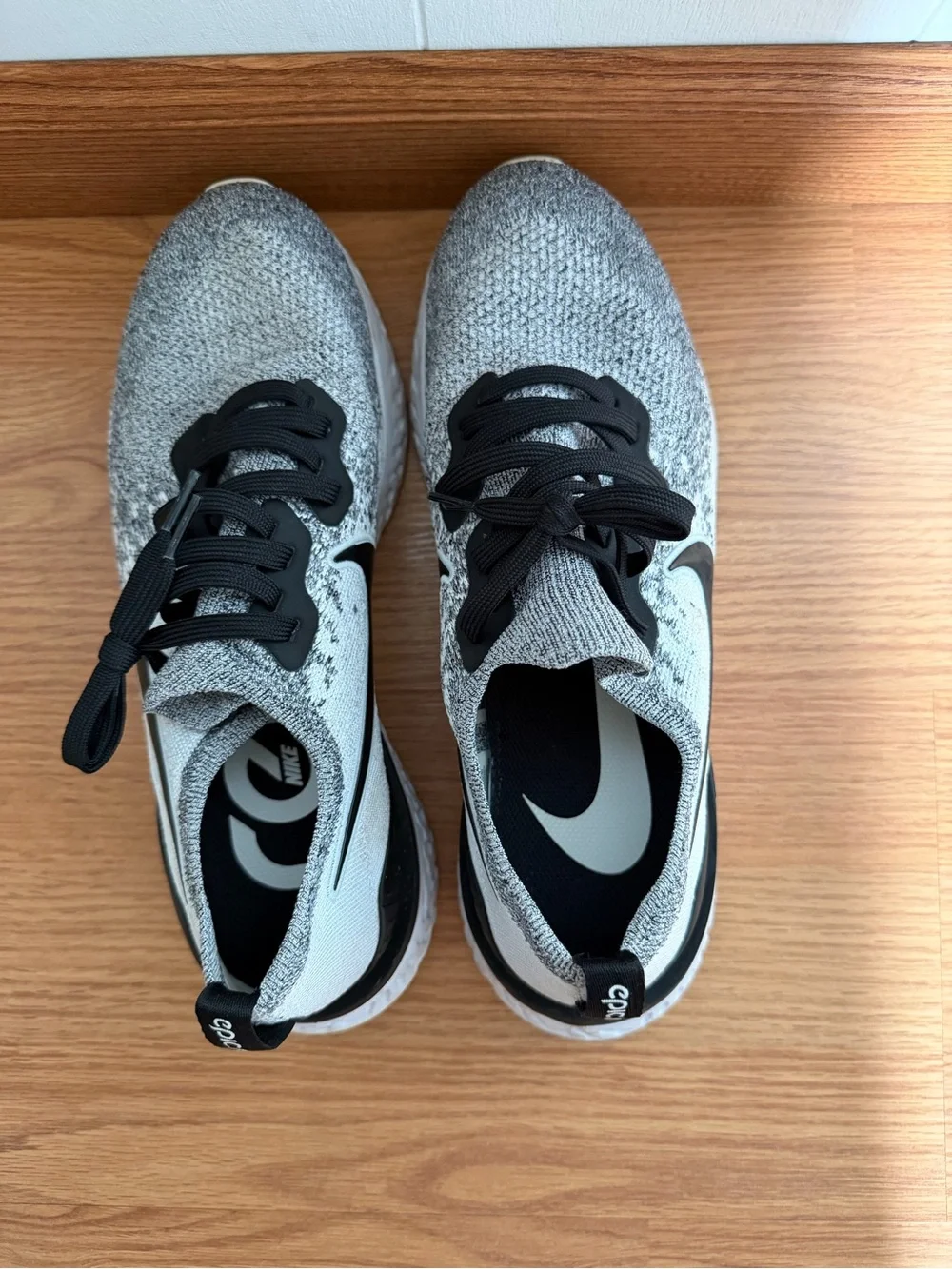 Nike Men’s Black and White Flyknit Running Shoes